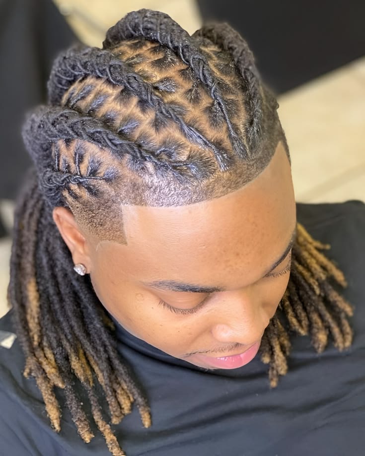Client with freshly retwisted dreadlocks and a clean line-up